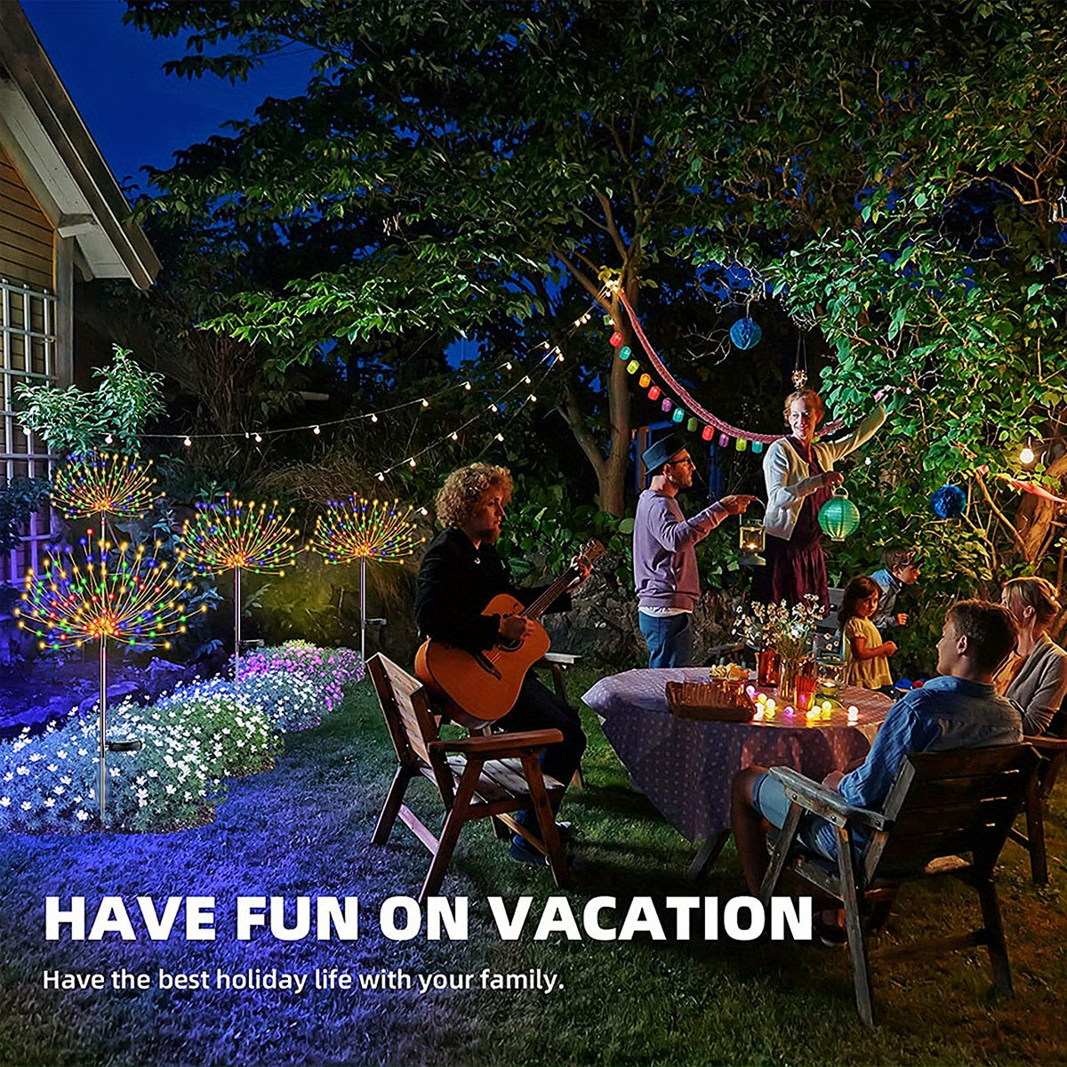 A family enjoys a night outdoors with glowing solar fireworks and string lights in a garden setting.