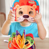 A child is wearing an orange tiger mask and holding a colorful animal and fruit dress-up playset.