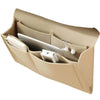 Organizador colgante de fieltro beige para cabecero con varios bolsillos para guardar objetos.