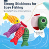 A set of colorful fishing sticks and stacking cups for a Montessori fishing game.