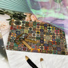 A colorful bohemian mandala cotton fabric swatch with intricate patterns is displayed on a white surface.