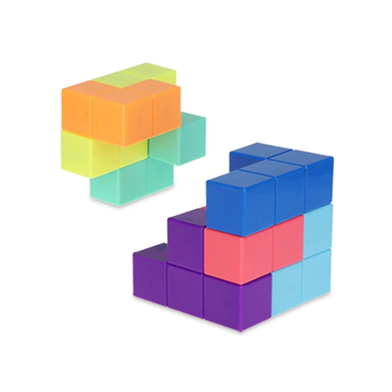A set of colorful magnetic building cubes stacked in various shapes and colors.