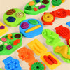 A colorful set of clay play tools featuring various food molds like hamburgers, noodles, and ice cream in green, yellow, and 