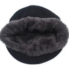 A black knitted winter beanie hat with a thick, gray faux fur trim.