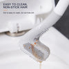 Close-up of a white golf-style silicone toilet brush with a self-opening holder showing cleaning bristles.