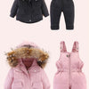 A set of pink baby winter down jacket and pants with faux fur hoods.