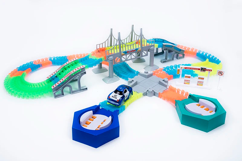 A glowing magnetic race track set featuring ramps and bridges in various colors like orange, green, and blue.