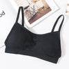 Black seamless U-back bralette with removable pads displayed on a white background.