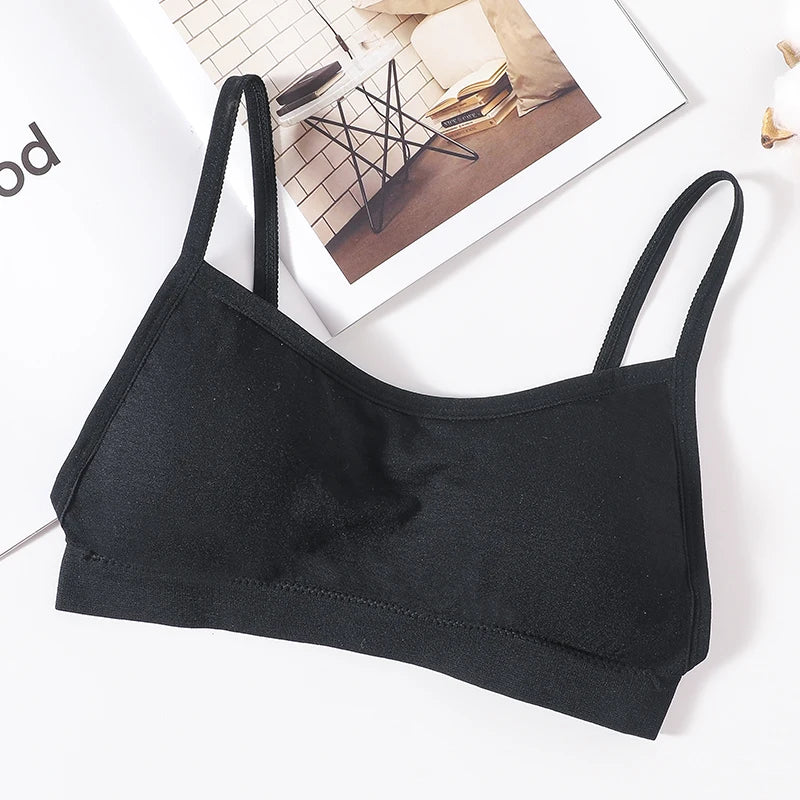 Black seamless U-back bralette with removable pads displayed on a white background.