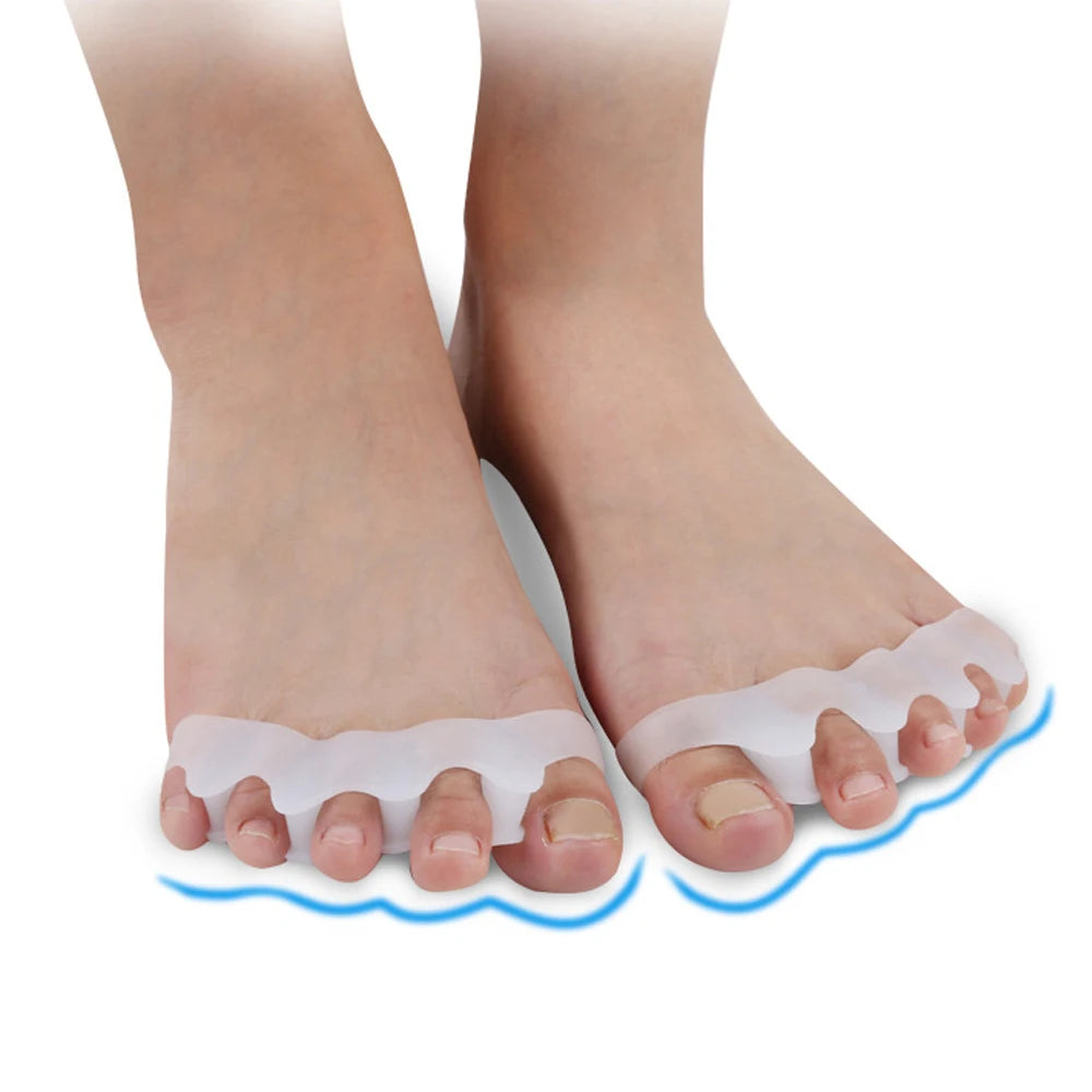 A pair of feet showing soft gel toe separators placed on the toes for relief.