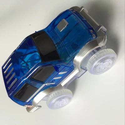 A blue and silver magnetic race track set featuring ramps and bridges with glowing lights.