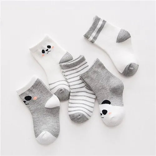 A set of five striped cotton baby socks featuring cute animal designs in gray and white.