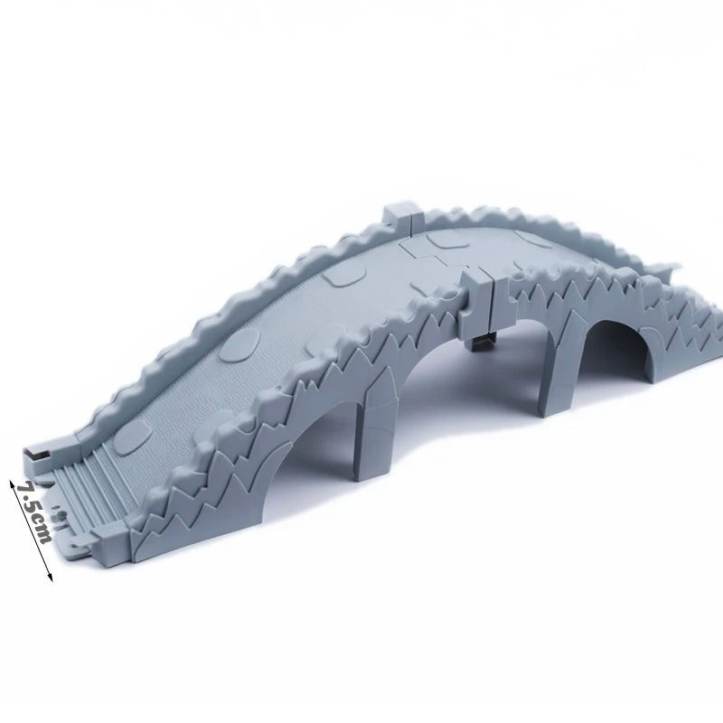 A gray magnetic race track set featuring ramps and bridges for building