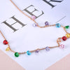 Collar de oro delicado con colgantes de cristal de colores y CZ en estilo bohemio.