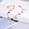 Collar de gargantilla bohemia de cristal en tono dorado con colgantes de gemas de circonita de colores.