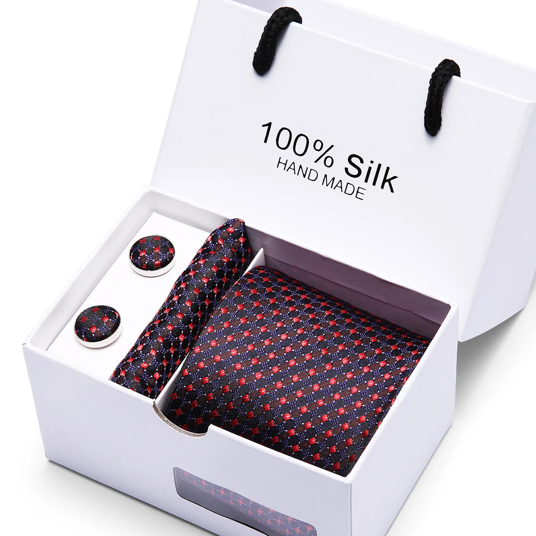 Corbata de seda azul marino hecha a mano con estampado jacquard de cachemira, presentada en una caja blanca.