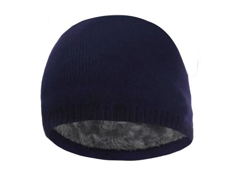 Dark navy blue knitted winter beanie hat with a fuzzy lining
