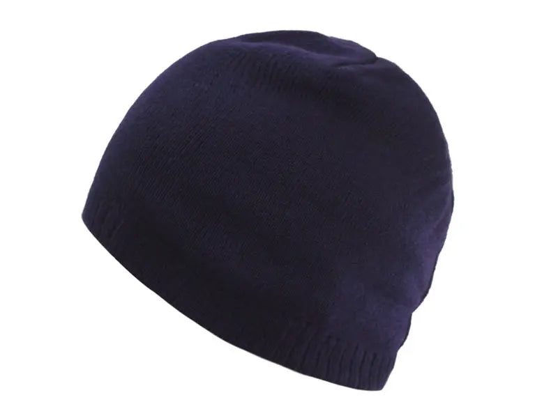 A dark navy blue knitted winter beanie hat shown from the side.