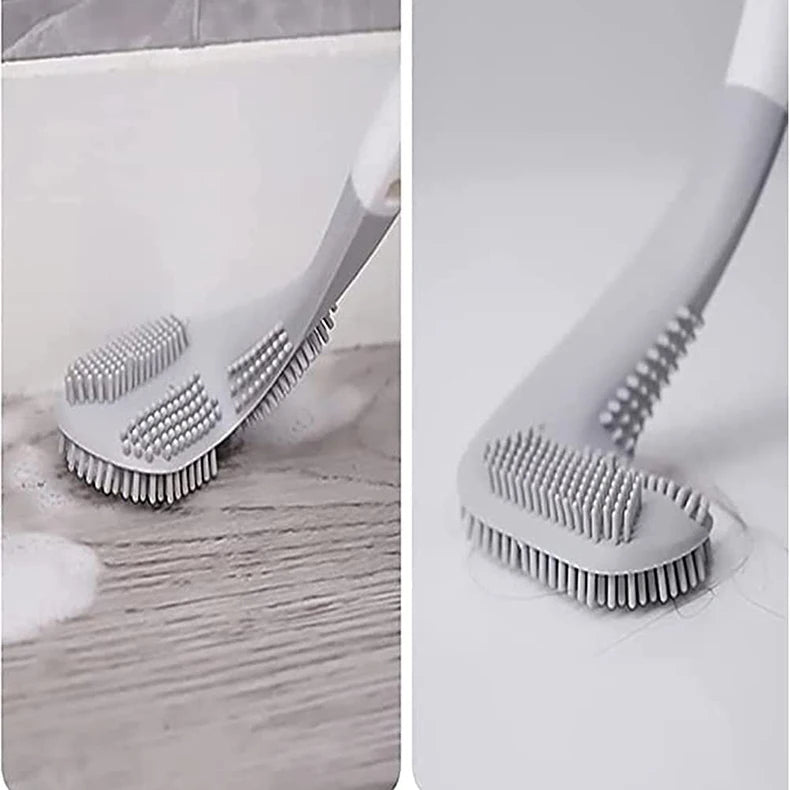A close-up view of a gray silicone toilet brush with a self-opening holder, showing the bristles and handle.