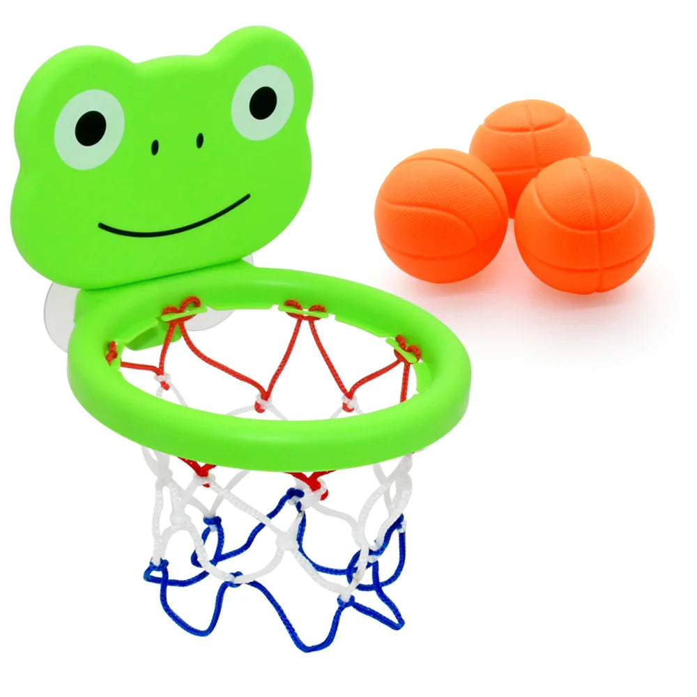 Et basketballsett i form av en grønn frosk med oransje baller og nett.