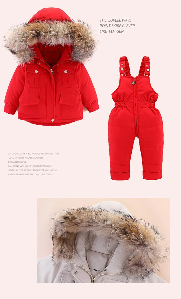 A red baby winter down jacket and pants set with a faux fur hood.