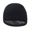 Black knitted winter beanie hat with a ribbed texture