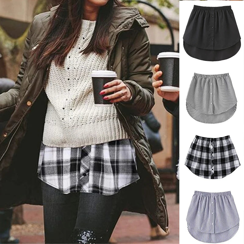 A woman wearing a plaid skirt and sweater, with an adjustable shirt extender visible.