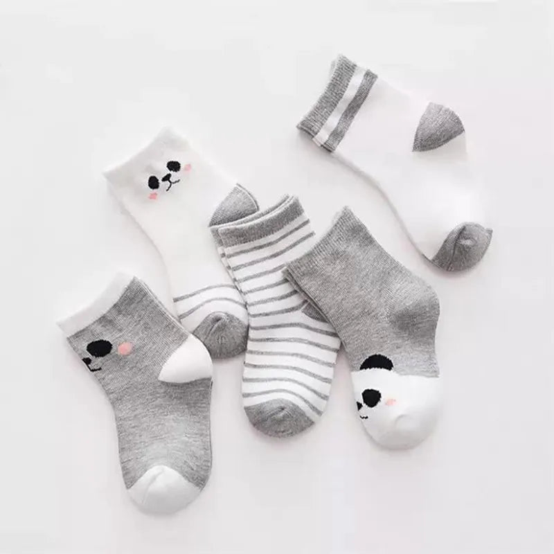 A set of five striped cotton baby socks featuring cute panda designs