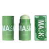 Three versions of a green tea cleansing stick mask product in glass jars and packaging.