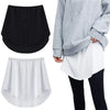 A black and white adjustable shirt extender with an elastic waistband shown separately and worn on a person.