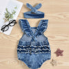 A denim romper for baby girls featuring rainbow embroidery and a matching headband.