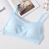 Light blue seamless U-back bralette with removable pads displayed on a white background.