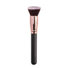 A professional makeup brush with a pink ferrule and black handle for foundation, concealer, and blush application.