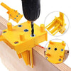 A yellow adjustable woodworking dowel drilling guide is shown with various components and usage examples on a wooden surface.