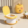 A yellow portable foldable toddler potty with a lid and a storage container is shown on a light-colored surface.