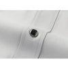 Close-up of a white long-sleeve formal shirt cuff with a silver button detail.