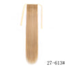 Long, straight blonde hair extension with a clip-in band shown vertically.