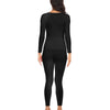 A woman wearing a black long-sleeved top and matching full-length leggings thermal underwear set.