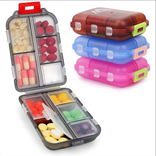 A set of compact travel pill organizers in various colors including brown blue and pink, featuring multiple compartments for 