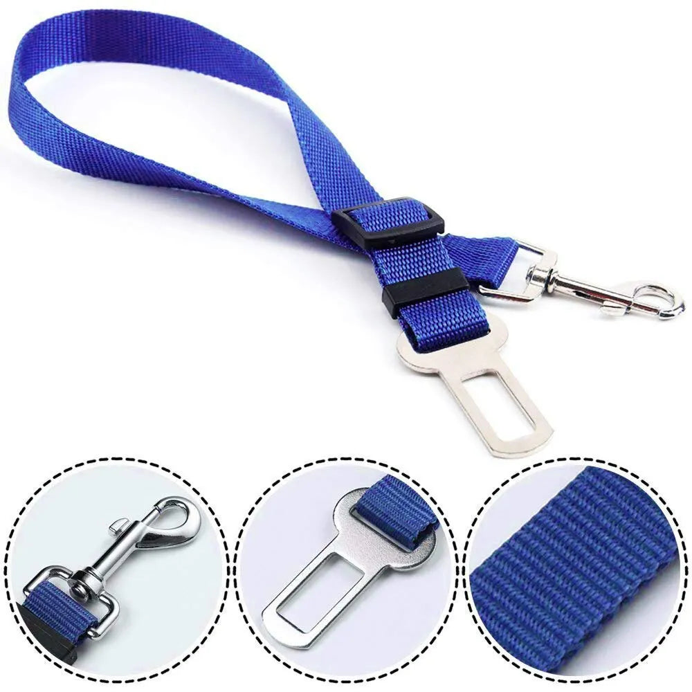 Arnés de seguridad ajustable azul para mascotas en el coche, con correa y clip metálico.