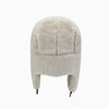 A light beige classic Russian Ushanka trapper hat with a thick fur lining.