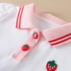 Pink and white kids summer cotton dress with a turn-down collar featuring red stripes and strawberry buttons