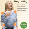 A woman is demonstrating a baby wrap sling carrier, showing how the cross shoulder straps are evenly distributed for easy car