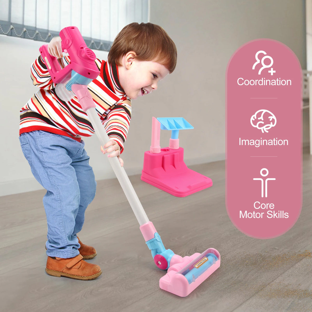 A young child is playing with a pink interactive toy vacuum cleaner, demonstrating coordination and imagination.