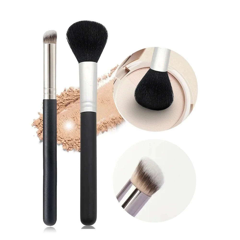 A set of professional makeup brushes including a large foundation brush, a powder brush, and a small blending brush.