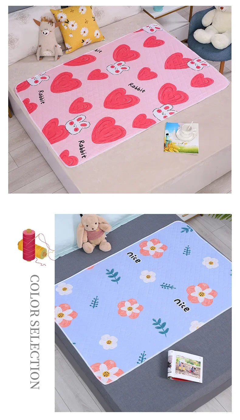 Pink and white cartoon design mattress protector featuring rabbit motifs for a baby