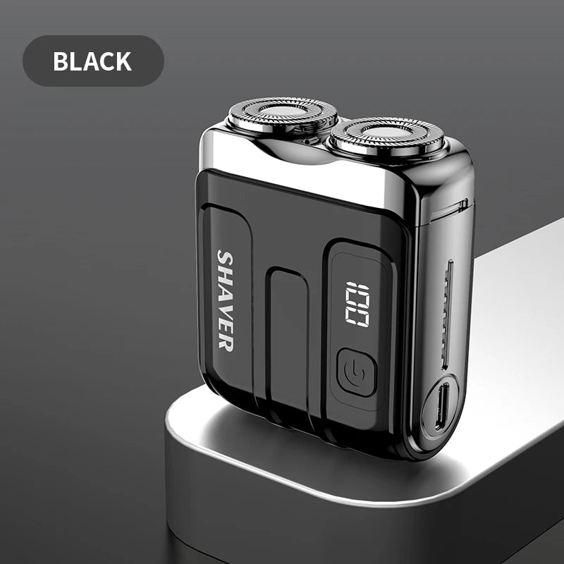 Una afeitadora eléctrica recargable mini USB negra con pantalla digital sobre una superficie gris claro.