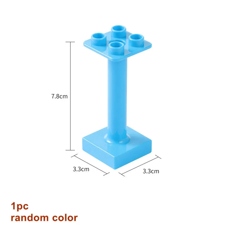 A light blue marble run building block set with tracks and funnels, shown from above.