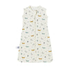 A cream-colored cotton baby sleeping sack patterned with small yellow and blue animal figures.