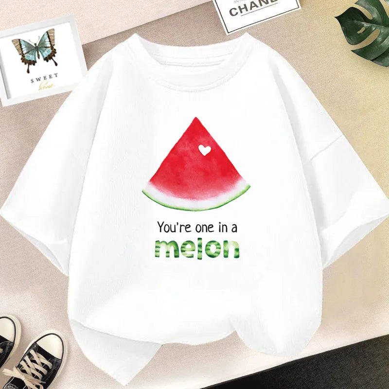 White kids t-shirt featuring a red watermelon slice graphic with the text You're one in a melon